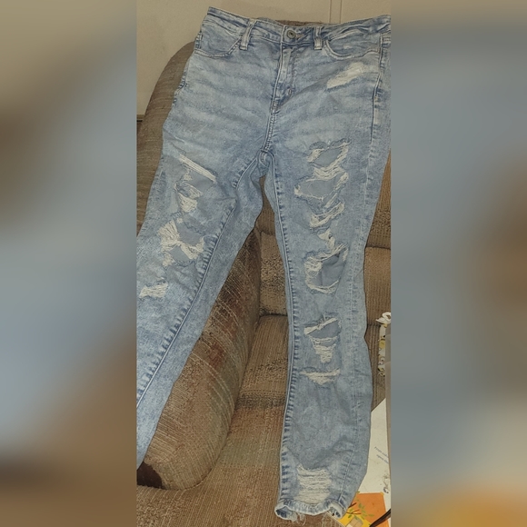 American Eagle Outfitters Destroyed Light Acid Wash Super Stretchy Jeans - Picture 4 of 15